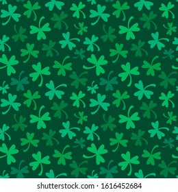 St. Patrick's Day background. Seamless vector pattern with shamrocks and clover. 