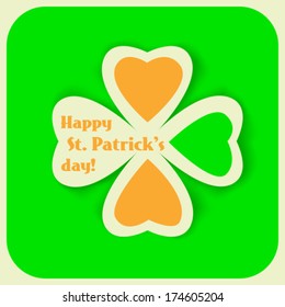  St. Patrick's day card, big paper clover and frame frame on green  background 
