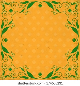  St. Patrick's day card, green floral frame with clovers on orange  background with clover pattern and old paper texture