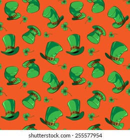 St. Patrick's day celebration seamless pattern with Leprechaun's hats of 5 different shapes and clover leaves isolated on orange background. EPS8 vector illustration