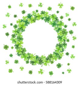 St. Patricks day circle frame from clover leaves. Greeting card template with copy space.