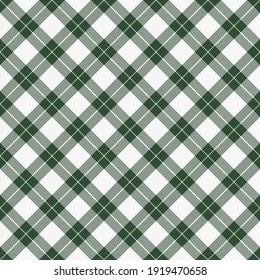St. Patricks day dioganal tartan plaid. Scottish pattern in green and white cage. Scottish cage. Traditional Scottish checkered background. Seamless fabric texture. Vector illustration