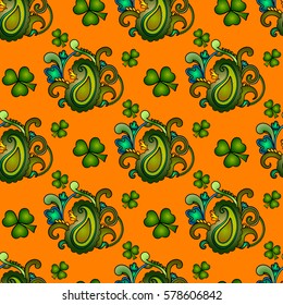 St. Patrick's day EPS10 vector seamless background, green and orange holiday pattern with paisley and clovers, floral and ethnic theme