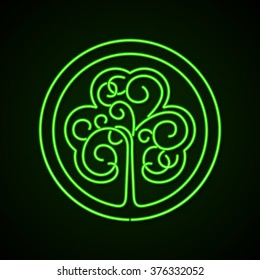 St. Patrick's day glowing neon sign. Stylized image of a shamrock on dark green background