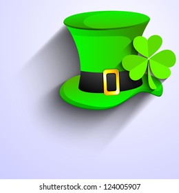 St. Patrick's Day greeting card or background with Leprechaun hat and shamrock on purple. EPS 10.