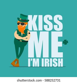 St. Patrick's Day greeting card, banner, poster, print on a t-shirt. Leprechaun hipster and an inscription kiss me I am Irish. Vector illustration