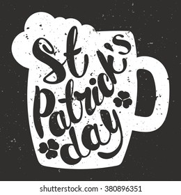 St. Patrick's Day greeting. Lettering St. Patrick's Day. Vector illustration. Mug of beer. shamrock