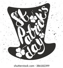 St. Patrick's Day greeting. Lettering St. Patrick's Day. Vector illustration. The text St. Patrick's Day in the form of Leprechaun hat. shamrock