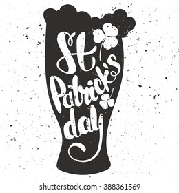 St. Patrick's Day greeting. Lettering St. Patrick's Day. Vector illustration. Mug of beer. shamrock