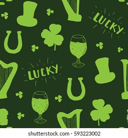 St Patrick's Day hand drawn seamless pattern, with leprechaun hat, coins, beer cup, four leaf clover, horseshoe and celtic harp vector illustration.