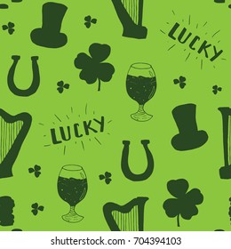 St Patrick's Day hand drawn seamless pattern, with leprechaun hat, coins, beer cup, four leaf clover, horseshoe and celtic harp vector illustration.