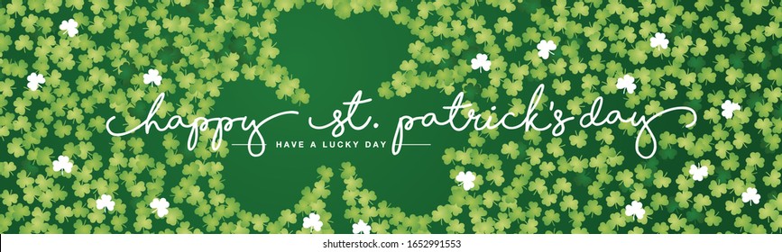 St Patricks Day handwritten typography text line design with full of green clovers background banner