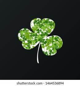 St. Patrick's Day holiday background. Green clover leaves pattern on a dark background. Ideal for greeting card, poster and web template. Vector illustration