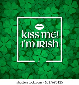 St. Patrick's day. Kiss me i'm irish message. Green clover shamrock background.