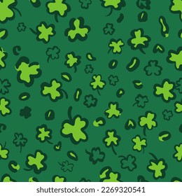 St. Patricks Day leopard seamless pattern made of shamrock or clover leaves. Trendy animal print. Spotted cheetah fur. Vector background for fabric, textile, wallpaper, wrapping paper, etc.