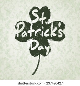 St. Patrick's day Lettering Inside Four Leaf Clover Silhouette. 