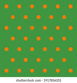 St. Patricks day pattern polka dots. Template background in green and orange polka dots . Seamless fabric texture. Vector illustration