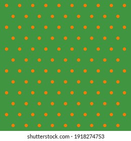 St. Patricks day pattern polka dots. Template background in green and orange polka dots . Seamless fabric texture. Vector illustration