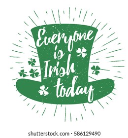 St. Patrick's Day quote typography lettering greeting card template on a grunge texture green leprechaun's hat with lucky shamrock clover for print, t-shirt, design element. Everyone is Irish today