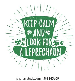 St. Patrick's Day quote typography lettering greeting card template on a grunge texture green hat with lucky shamrock clover for print, t-shirt, design element. Keep calm and look for a leprechaun