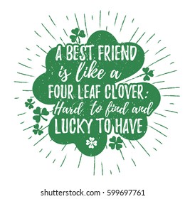 St. Patrick's Day quote typography lettering greeting card template on a grunge texture green 4-leaf lucky shamrock clover for print, t-shirt. A best friend is like a four-leaf clover hard to find