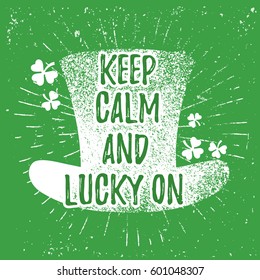 St. Patrick's Day quote typography lettering greeting card template on a grunge texture green shape with lucky shamrock clover for print, t-shirt, festive design element. Keep calm and lucky on