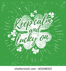 St. Patrick's Day quote typography lettering greeting card template on a grunge texture green shape with lucky shamrock clover for print, t-shirt, festive design element. Keep calm and lucky on