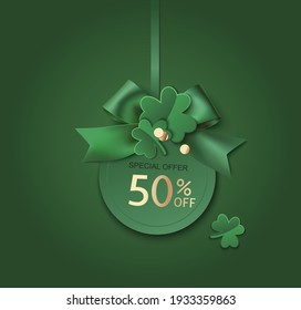 St Patrick's day sale  design template. Green price tag with clover leaves and  bow on green background.
 Vector stock illustration.