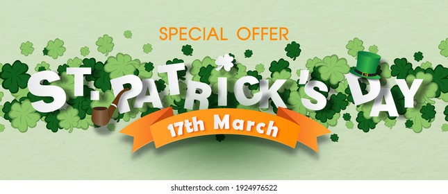 St. Patrick's Day and sale wording with high hat, tobacco pipe on the day of event's ribbon and clovers green background. St. Patrick's Day greeting card in paper cut and vector design.