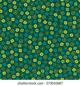 St. Patrick's Day seamless pattern with clover on green background. Perfect for wallpaper, holiday greeting cards, gift paper.