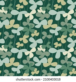 st patrick's day seamless vector pattern. Clover leaves on green background