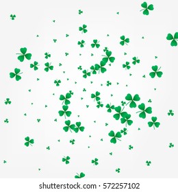 St. Patrick's day shamrock background. Flying shamrock leaves.
