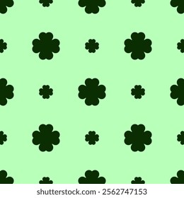 St. Patricks Day shamrock seamless pattern. Green clover leaves on dark green background. St. Patricks Day background. Vector template for fabric, textile, wallpaper, wrapping paper. 