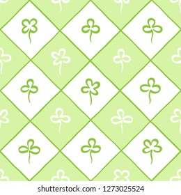 St. Patrick's day, spring background, seamless vector pattern. Hand marker drawn stylized clover leaves, shamrock, trefoil, quatrefoil and diagonal square grid, check, plaid, trellis geometric texture