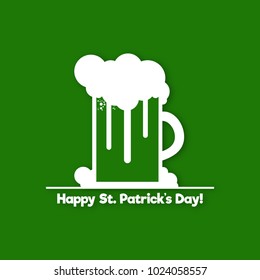 St. Patrick's Day symbol design. A glass of beer with foam and lettering on green background. vector