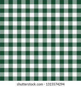 St. Patricks day tartan plaid. Scottish pattern in green and white cage. Scottish cage. Traditional Scottish checkered background. Seamless fabric texture. Vector illustration