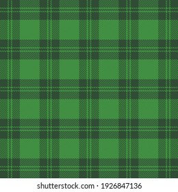 St. Patricks day tartan plaid. Scottish pattern in green and dark green cage. Scottish cage. Traditional Scottish checkered background. Seamless fabric texture. Vector illustration