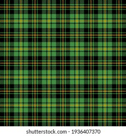St. Patricks day tartan plaid. Scottish pattern in green and orange cage. Scottish cage. Traditional Scottish checkered background. Seamless fabric texture. Vector illustration
