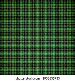 St. Patricks day tartan plaid. Scottish pattern in green and orange cage. Scottish cage. Traditional Scottish checkered background. Seamless fabric texture. Vector illustration