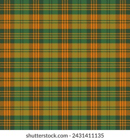 St. Patricks day tartan plaid. Scottish pattern in green and orange cage. Scottish cage. Traditional Scottish checkered background. Seamless fabric texture. Vector illustration