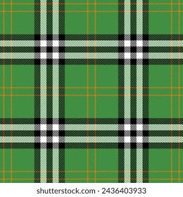 St. Patricks day tartan plaid. Scottish pattern in green, orange and white cage. Scottish cage. Traditional Scottish checkered background. Seamless fabric texture. Vector illustration