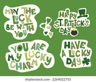 St. Patrick's day themed sticker set with hand drawn lettering and various objects on green