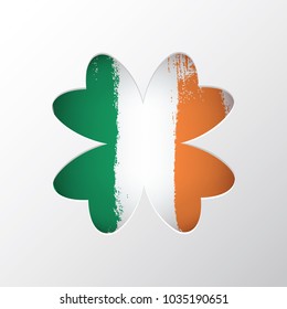 St Patrick's Day Vector background with Clover. Lucky spring symbol. Trendy paper cut style. Cut-out from paper Shamrock shape with grunge brush strokes of the irish national flag colors. Stock vector
