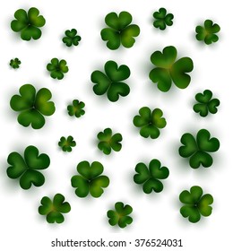 St Patricks day vector background, green clovers on white