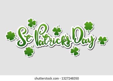 St. Patrick's Day Vector Green  text lettering isolated illustration with clover on grey background  