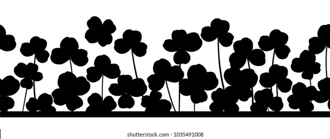 St. Patrick's day vector horizontal seamless background with shamrock leaves.