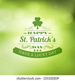 St. Patricks Day Vintage Holiday Badge Design. Vector Design Greetings Card Or Poster With Blurred Green Backdrop