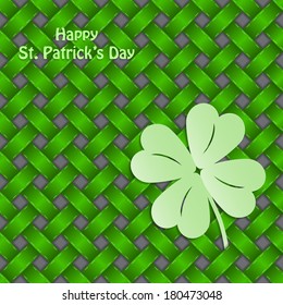 St Patrick's shamrock on seamless green background texture