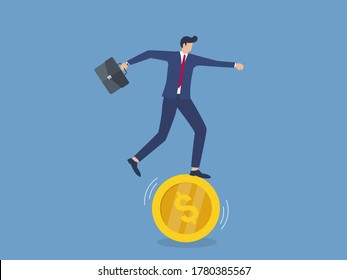 stability or balance of economics and investment or risk for losing job concept, businessman balancing not to fail from walking on golden coin. Financial, business, banking loan and debt risk.
