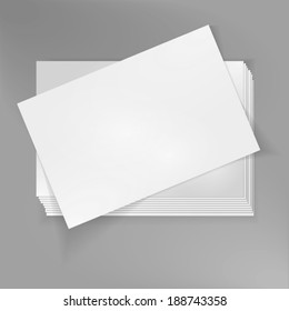 Stack Of Blank Business Cards On Grey Background.